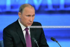 Putin says Russia economy will be cured but offers no remedy